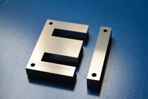 China Low Iron Loss Coated Ei Transformer Core Silicon Steel Laminated Magnetic Core factory
