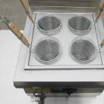 Counter top noodle cooker with 4 baskets