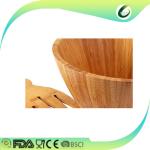wooden bamboo salad bowls with serving hands and serving bowls