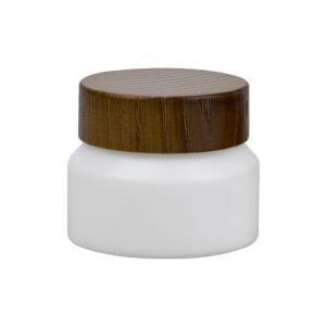 China Natural 1oz 30ml Cosmetic Cream Glass Jar Matte White Glass Clay Mask Jar With Wooden Lid factory