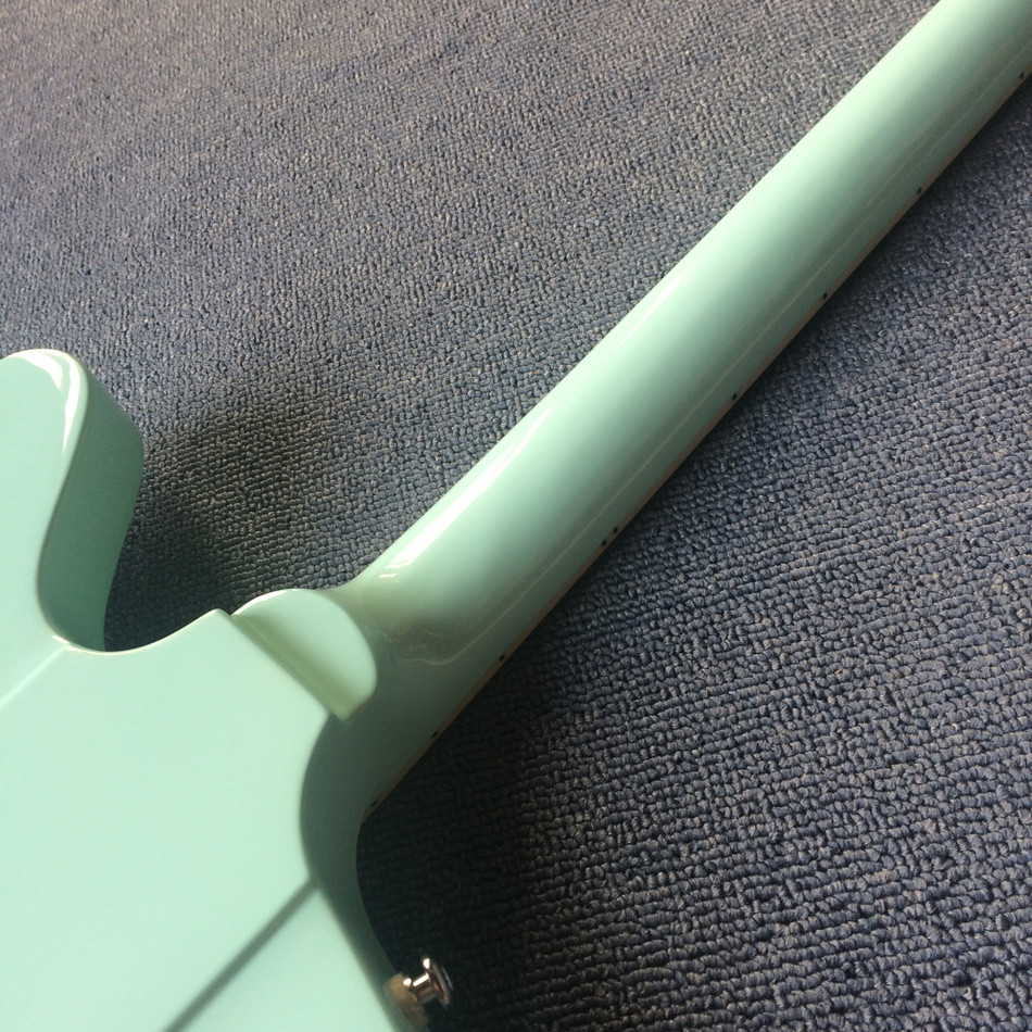 High quality custom electric guitar, rosewood fingerboard, Light green electric guitar
