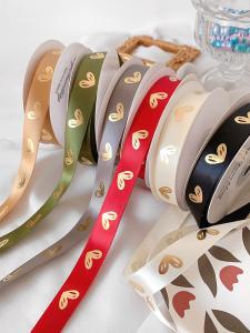 China 16mm Heart Pattern Gold Foil Printed Ribbon For Gift Packing And Decoration factory