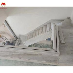 White Wood Look Marble Tiles Stair Follow Veins for a Versatile and Timeless