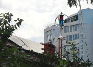 China Residential Hybrid Solar Wind Power Generation System 600W 1000W Wind Turbines factory