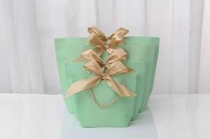 China Stamping Logo Light Green Cosmetic Shopping Bag Bow Tie Ribbon White Gift Bag factory