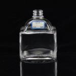 Industrial 700ml Glass Bottle for Beverage Industry in Thumb Shape