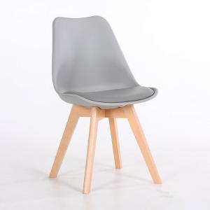 China Natural Solid Wood Legs PP Plastic Dining Room Chairs With Cushioned Pad factory