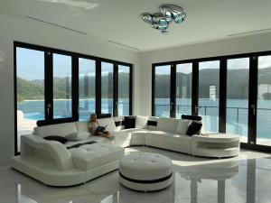 China Custom Luxury Hotel Furniture Regal Elegance Antique Reclining Leather Sofa Bed Sectional factory