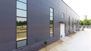China Sand Blasting Steel Frame Industrial Garage With Aluminium Glass Sliding Windows factory