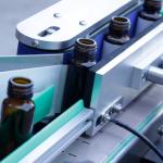 Npack Electric Driven Automatic Round Bottle Labeling Machine For Plastic Pet