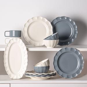 China Solid Color Dinnerware Set Nordic Style Ceramic Plates And Bowls With Sunflower Shape factory