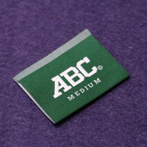 China Polyester Woven Apparel Labels End Fold For Clothing , Sew On Name Tags factory