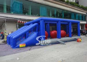China Outdoor double lane adults interactive inflatable assault course with big bouncing balls on sale