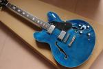 High quality electric guitar in blue color hollow body with chrome hardware