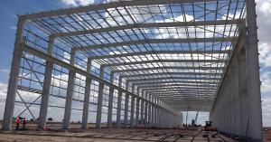 China Metal Sheet Wall Commercial Steel Frame Building with Painting or Hot Dipped Galvanized Surface factory
