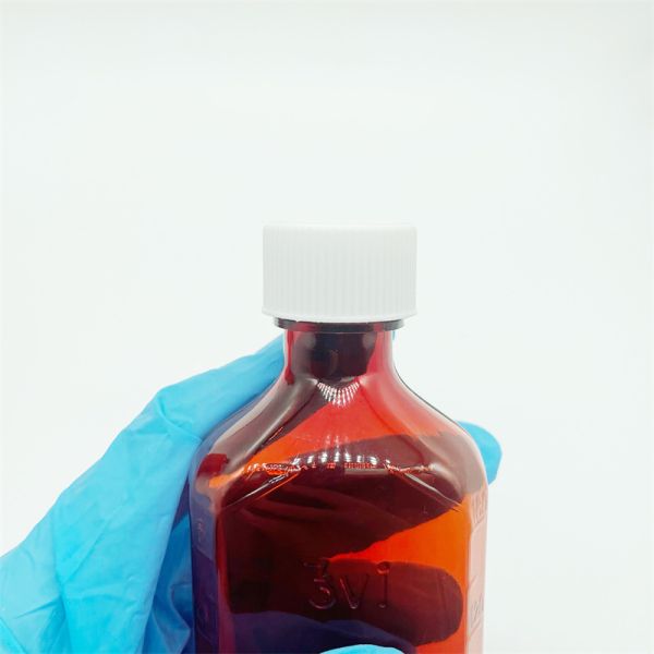 Cough syrup bottle close-up