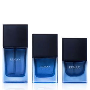 China Luxurious Blue Frosted Glass Foundation Empty Bottle With Pink And Purple Caps factory