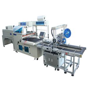 China Label Sticker Packing Machine Heat Shrinking Wrapping Photo Frame Toys Packaging Machine factory