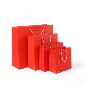 China Different sizes pure red your logo printed cotton rope handel clothes paper bag factory
