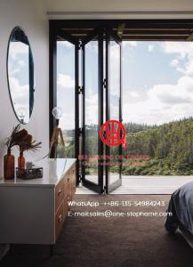 China Cayoe Exterior Glass Folding Door Lowes Aluminum Bi Folding Door factory