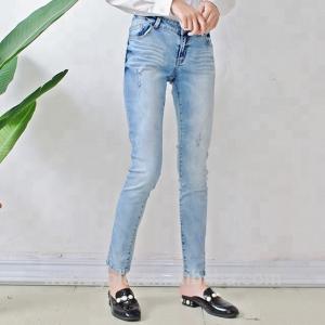 China Stretch Whisker Distressed Women Denim Skinny Jeans Light Blue Custom Size factory