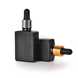 China Cosmetic Packaging Glass Dropper Bottle Frosted Black Customized on sale
