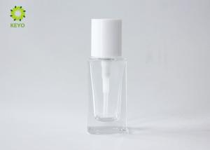 China 30ml Clear Glass Liquid Foundation Bottle Square Shape With White Pump Cap factory