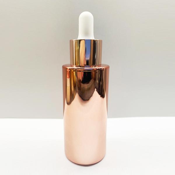 OEM ODM Rose Gold Electroplating Glass Dropper Bottles Round Shape
