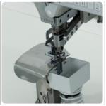 Computerized attaching shoulder pads to armholes and trimming edge sewing