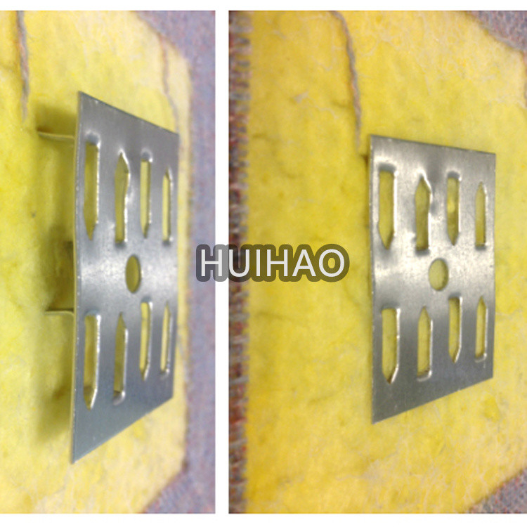 Stainless steel impaling clips attach acoustic panels703 board to walls