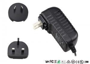 China 15W Interchangeable Plugs Universal Travel Adapter 15V 1A Switching Adapters factory