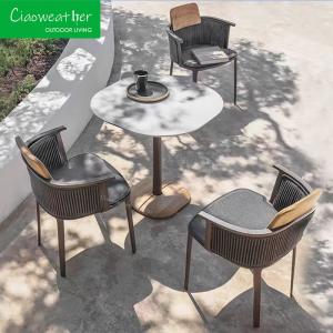 China Modern Hotel Patio Teak Rattan Chair Contemporary Design with Waterproof Outdoor Cushion factory