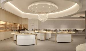 China Wall Mounted Jewelry Showcase Display With LED Light Irregular Golden Jewelry Display Cases factory