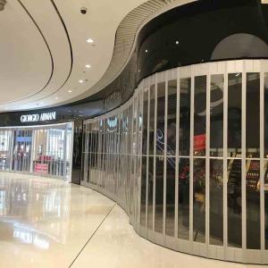 China Manual Side Folding Shutter Doors , Storefront Security Closures factory