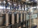 SUS316 5l Servo Liquid Filling Machine 3600BPH volumetric bottle filler