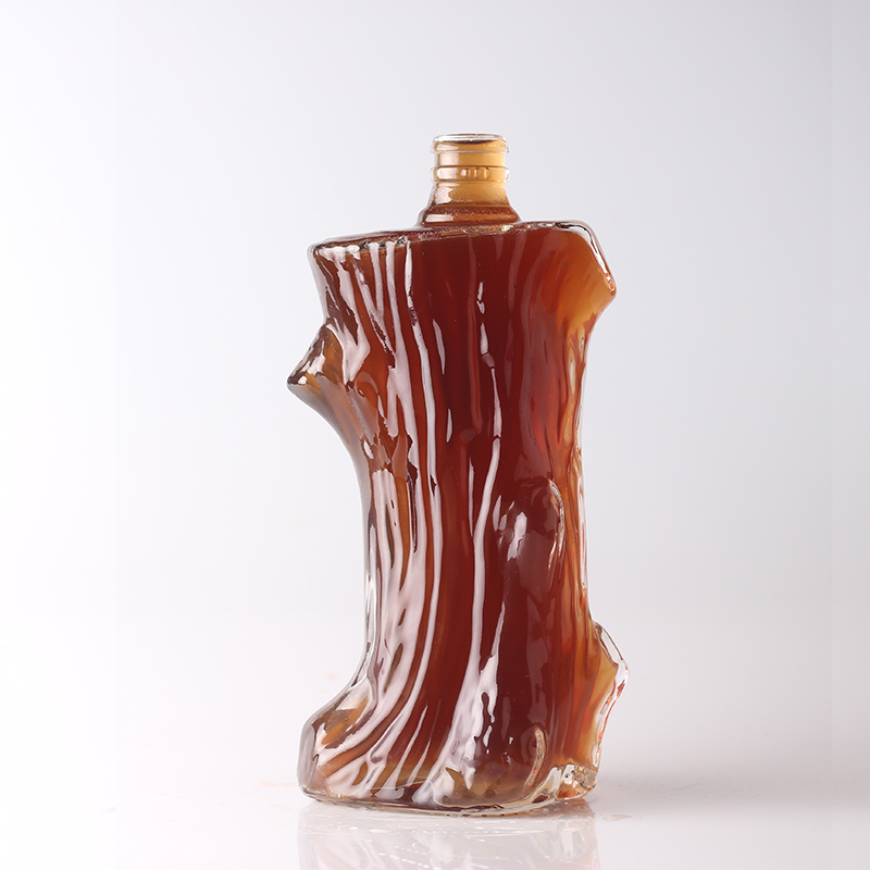 Customized Surface Handing Football Shaped Glass Bottle for Unique Alcohol Beverage