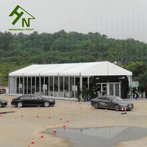 China Cutomized Hard Glass Wall Waterproof Fabric Tent 18 Degree Pitch 30m Long factory