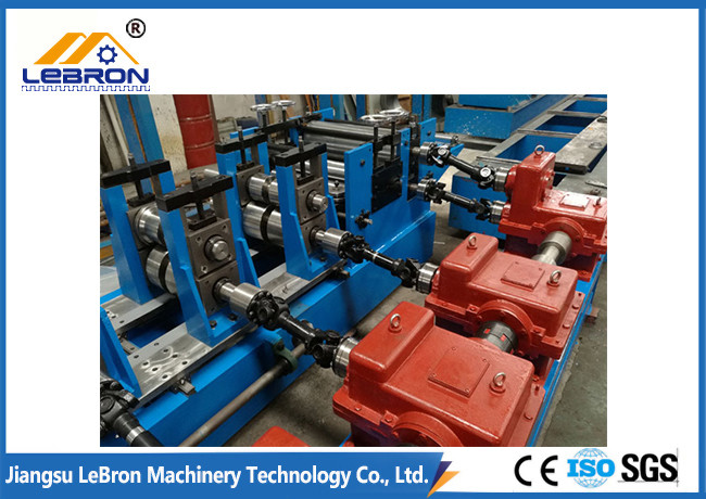 Long Time Service PLC Control Automatic Storage Rack Roll Forming Machine Hydraulic Cut