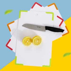 China BPA Melamine Free LFGB Plastic Chopping Board With Feet factory
