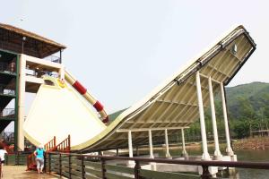 China Giant Aqua Park Equipment Fiberglass Swing Water Slide for double interactive water fun factory