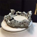 C Cheetah bracelet - showing the charm of courage, naughty or docile .18K gold