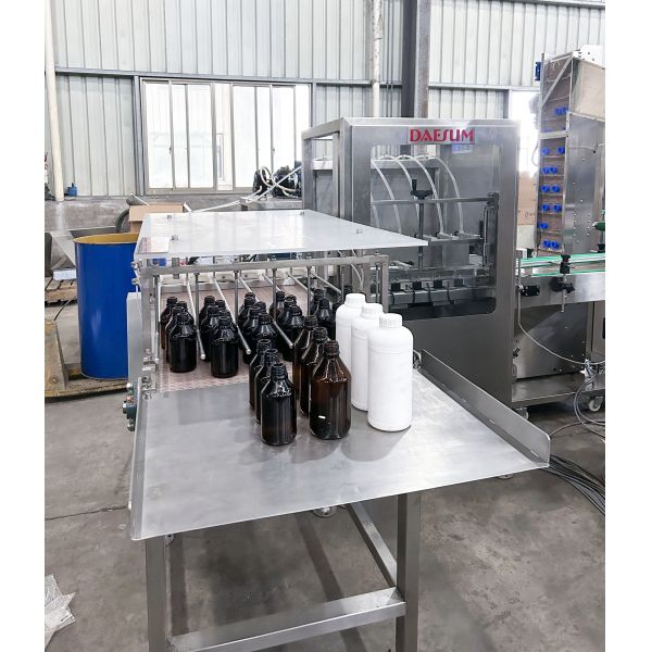 Fully Automatic 250-500ml Small Bottle Filling Machine with 6-16 Nozzles and 1000-2000 BPH Speed
