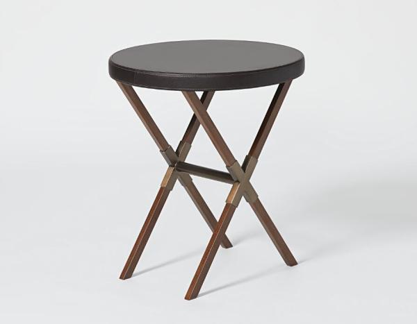 Antique brushed bronze metal base with upholstered leather top round hotel