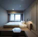 Adelaide hotel fitout furniture of laminate panel headboard with Tv cabinet and