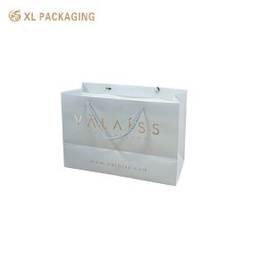 China XL Packaging Custom Logo Hard White Art Paper Bags Luxury Shopping Packaging With Die-Cut Handles Scratch-Resistant Coating Easy Carry Design Durable factory