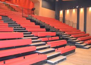 China Customized Space Retractable Grandstands With Red Upholstered Bench factory