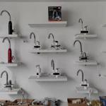 White ABS Kitchen Instant Hot Water Tap 220V Electric 360 Degree Rotating RoHs