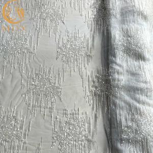 China Beautiful White Embroidered Glitter Lace Fabric MDX 20％ Polyester For Dresses factory
