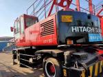Red 110KW 2100RPM Full Rotary 40T Tire Mounted Crane