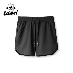 China Drawstring Men Sports Shorts Polyester Woven Plain Jogger Workout Shorts factory